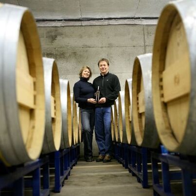 Sue and Gerry, owners of Skaha Vineyard in the cellar room 
